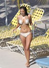 Tulisa Contostavlos bikini body while hanging out poolside in Miami